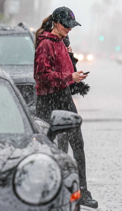 Dakota Johnson in a Black Cap