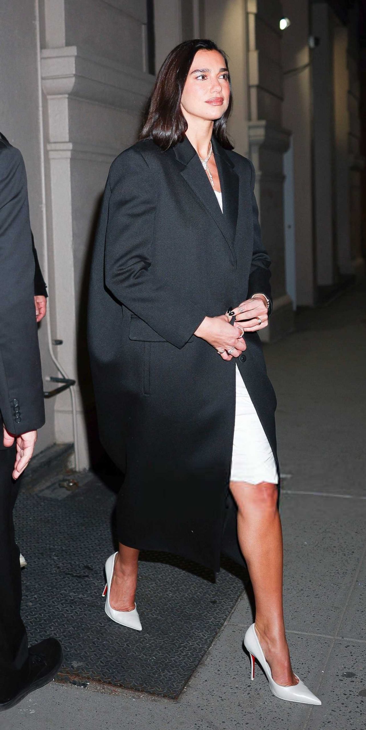 Dua Lipa in a Black Coat Leaves the Nespresso Global Ambassador Reveal Party in New York City 03/18/2026