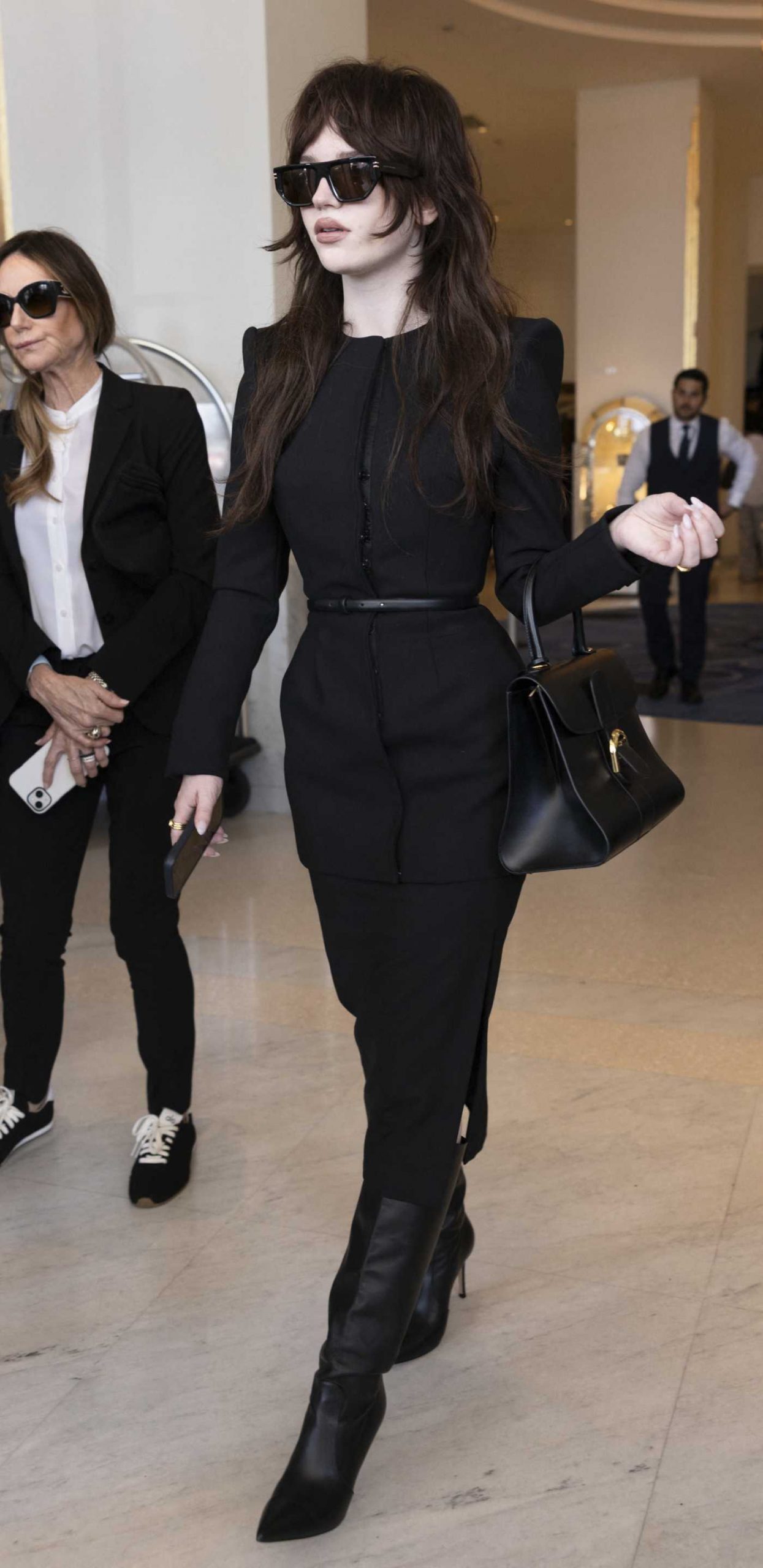 Sophie Thatcher in a Black Ensemble Leaving Hotel Martinez in Cannes 05/18/2026
