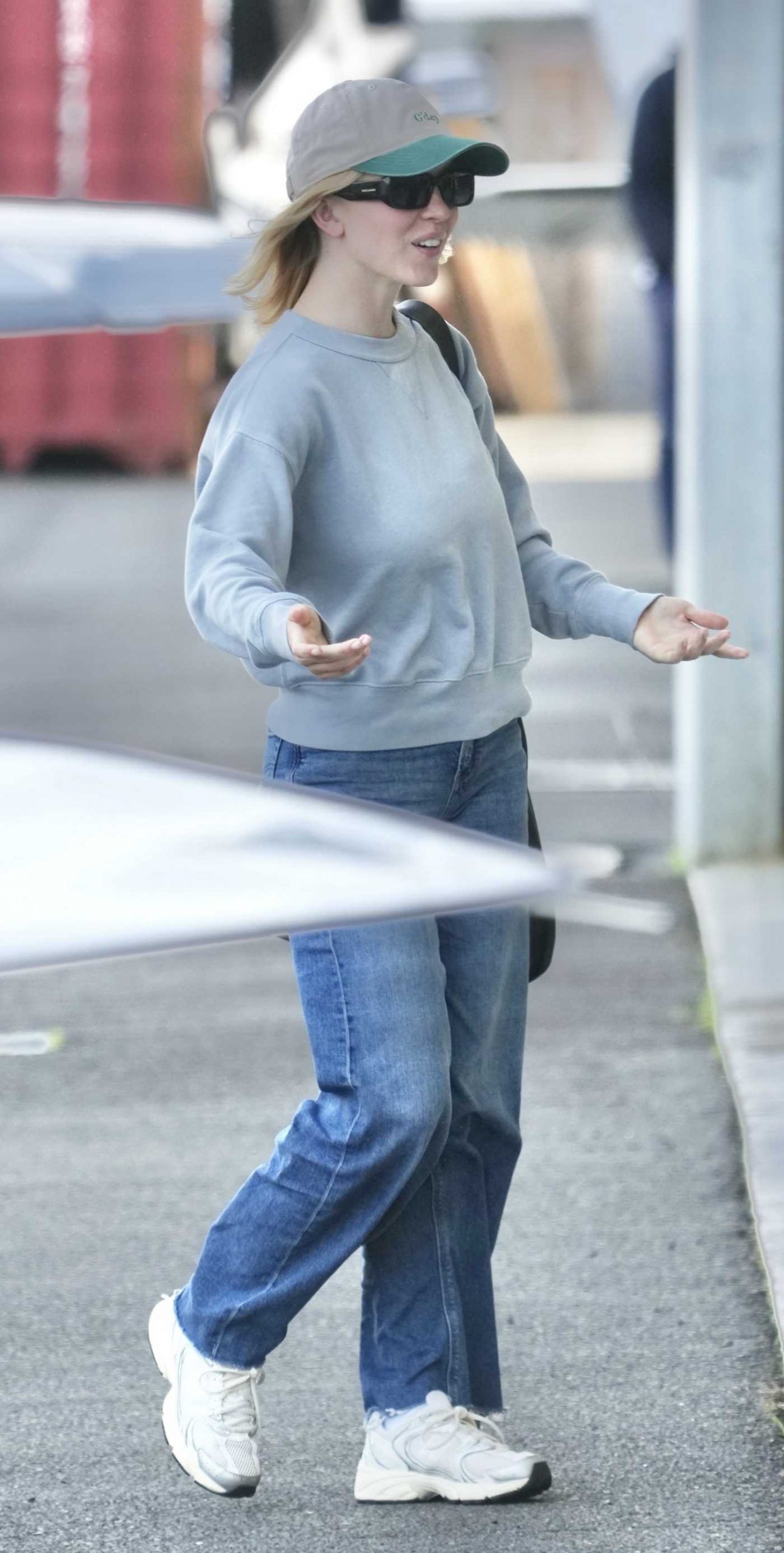 Sydney Sweeney in a Grey Sweatshirt Arrives Back to Gold Coast 05/11/2026