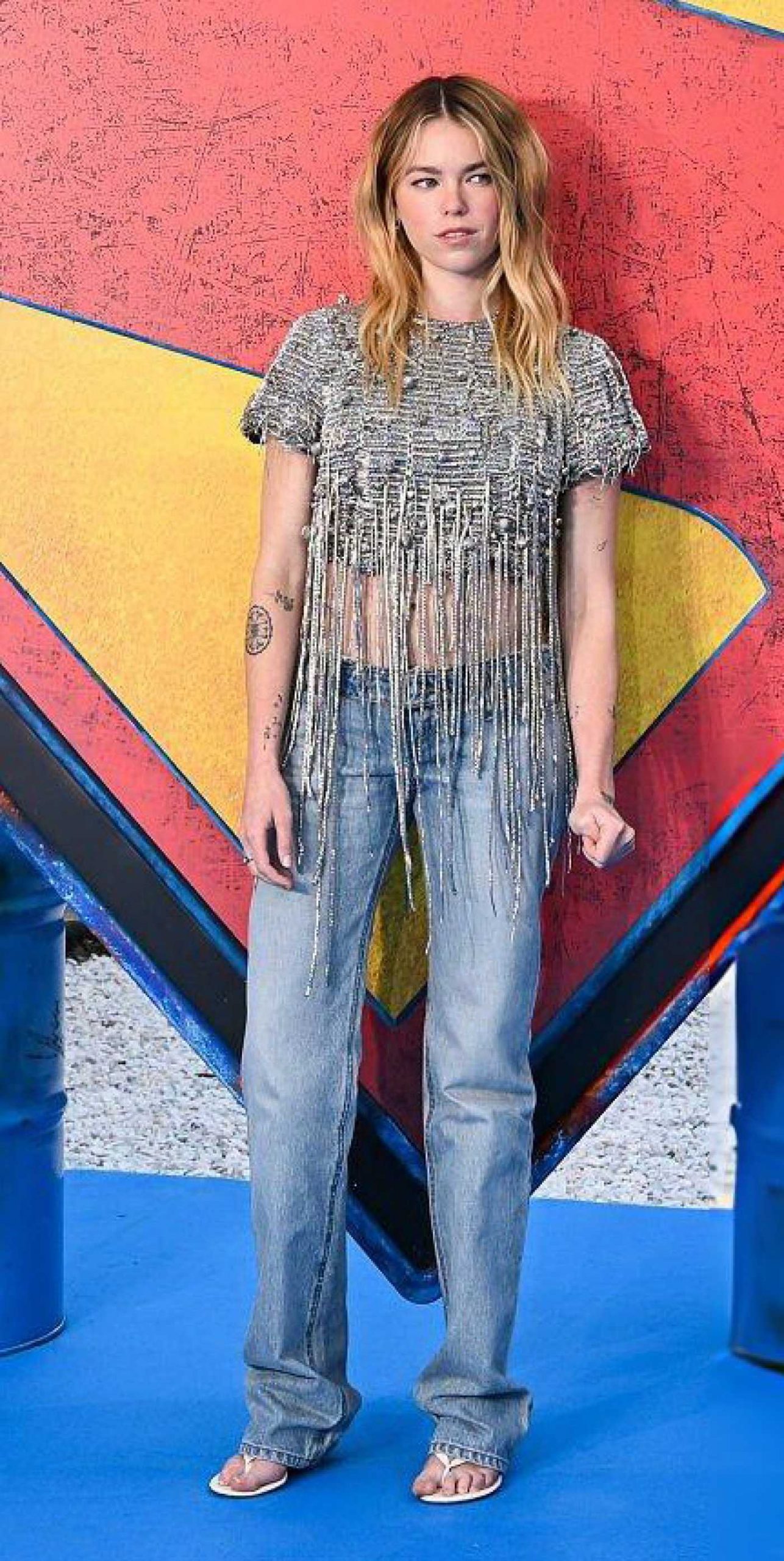 Milly Alcock Attends the Supergirl Photocall at the Village Underground in London 06/19/2026