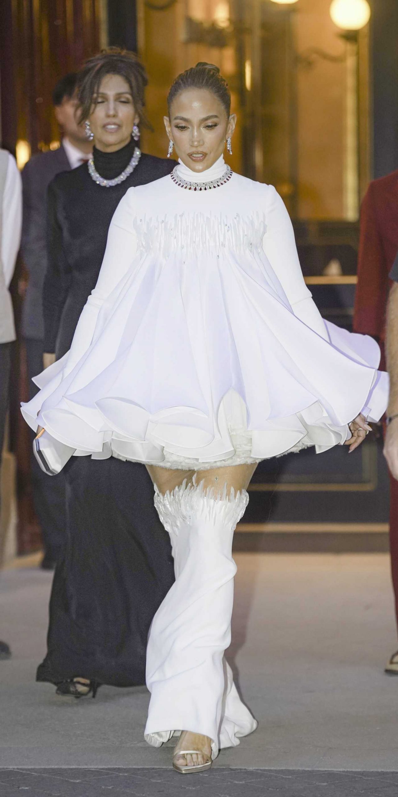 Jennifer Lopez in a White Dress Leaves Her Hotel in Paris 07/09/2026