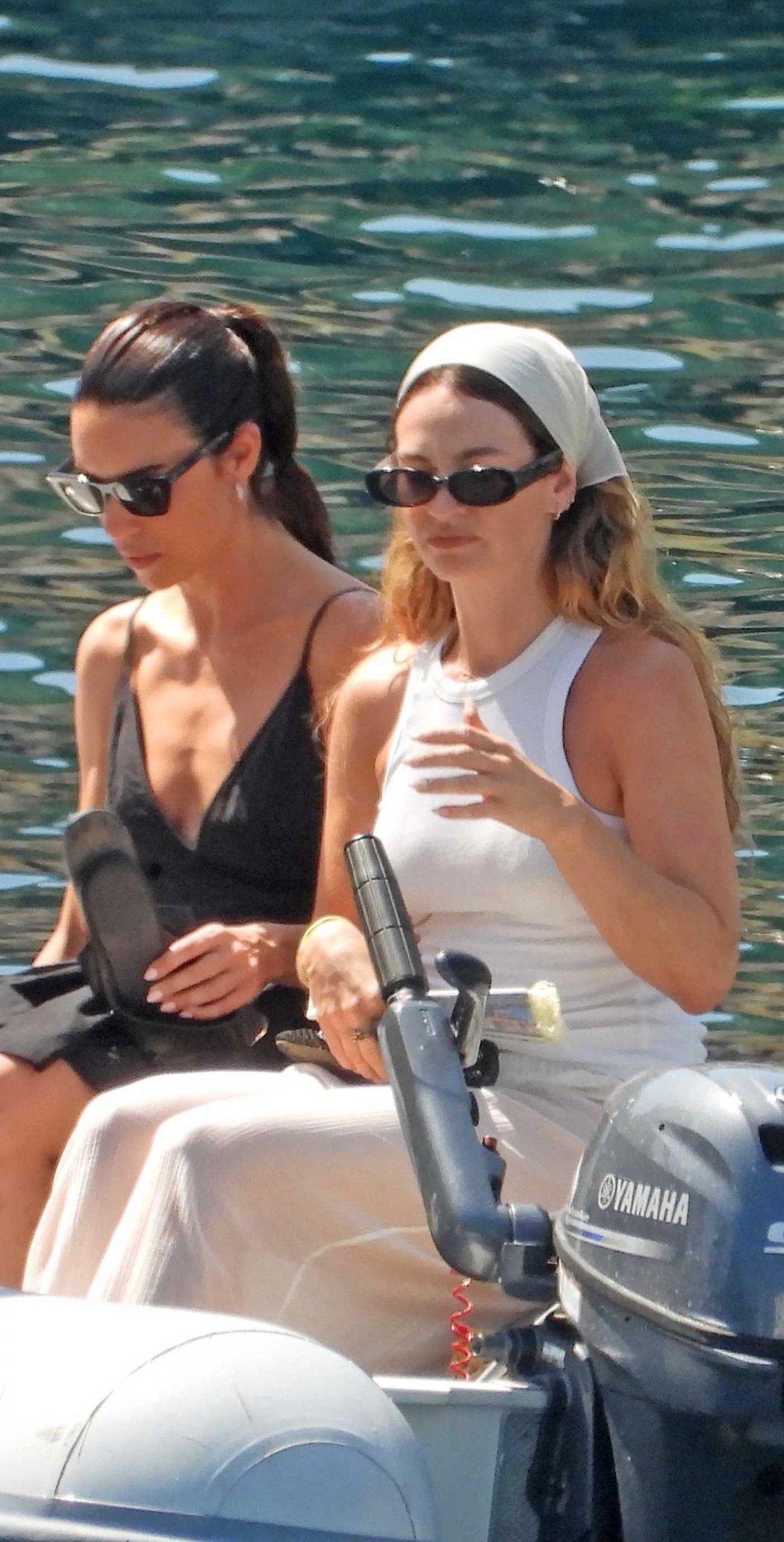 Lily James in a White Tank Top on a Boat in Portofino 07/17/2026