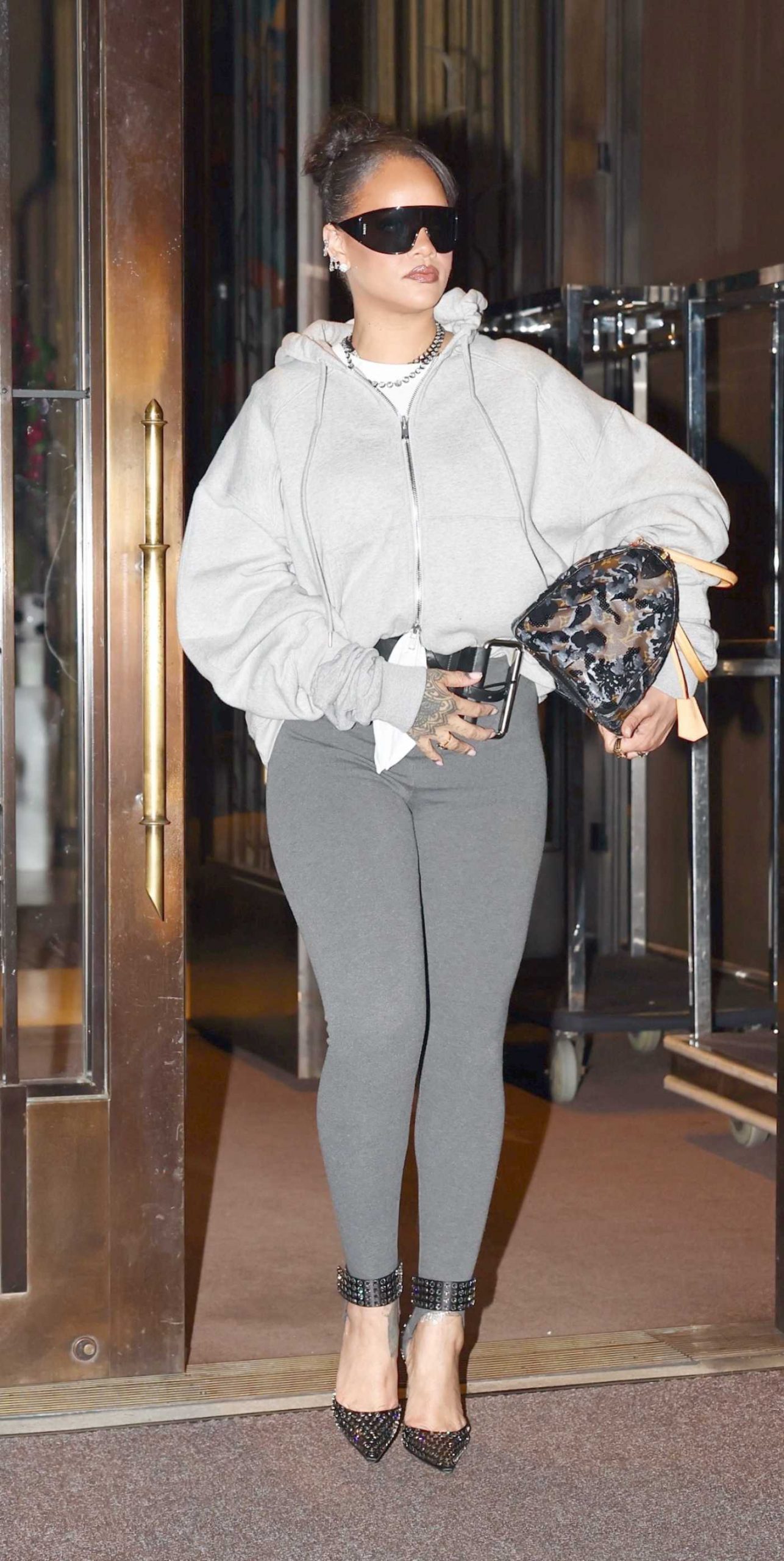Rihanna in a Grey Leggings Departed the Four Seasons Hotel in New York 07/10/2026