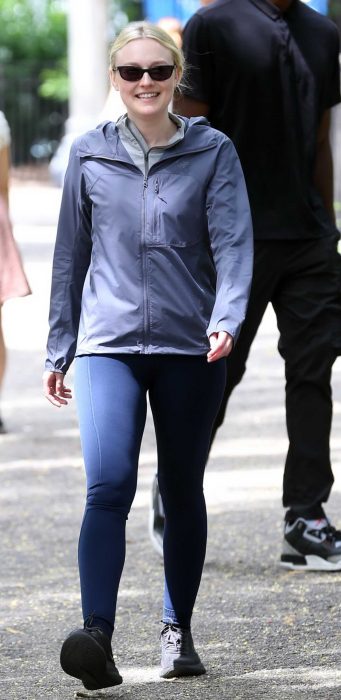 Dakota Fanning in a Grey Windbreaker