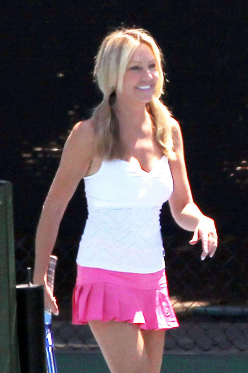 Heather Locklear Leggy Candids in a pink skirt at the Malibu Country Club