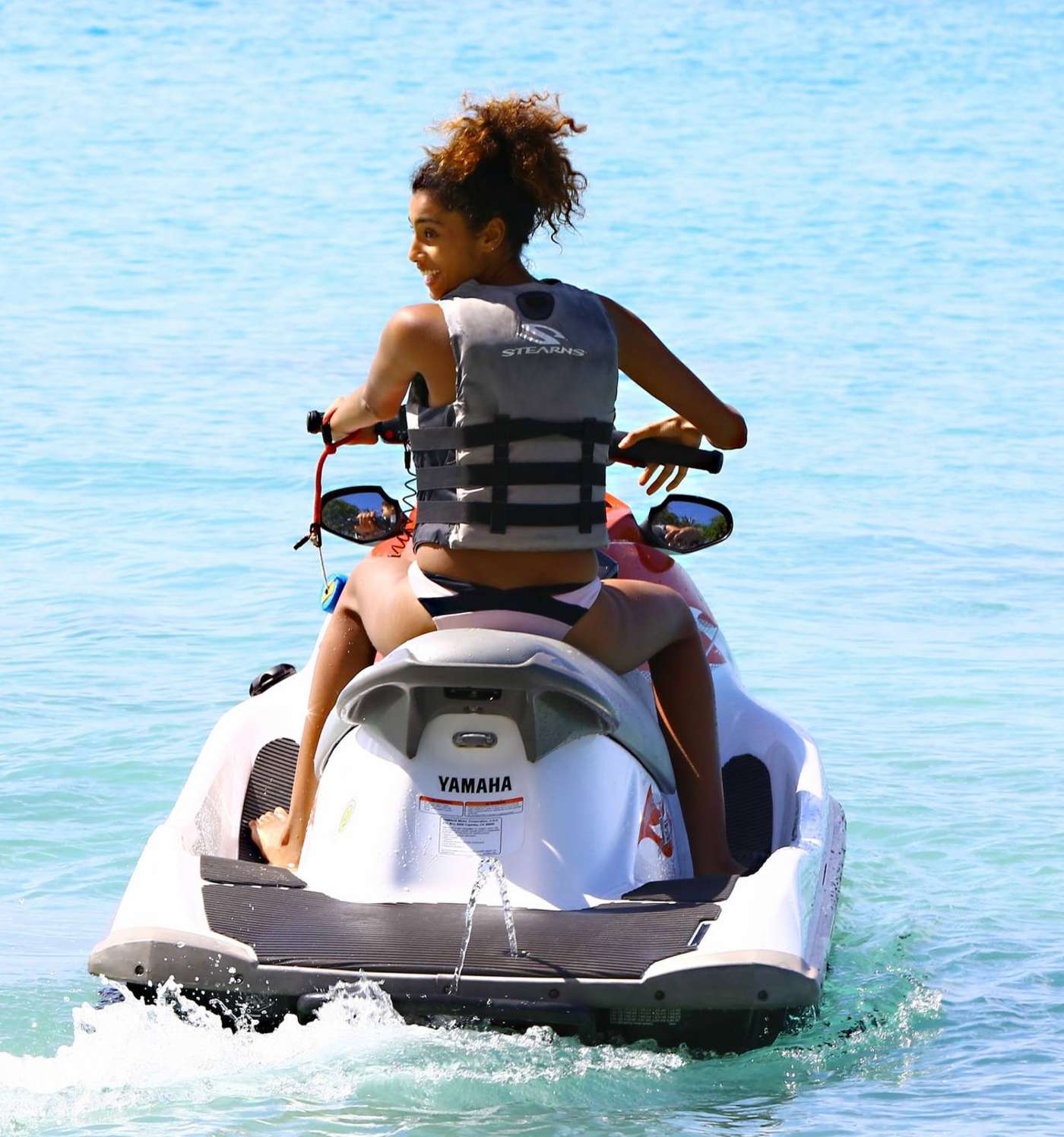 Imaan Hammam Riding Jet Skis in Barbados