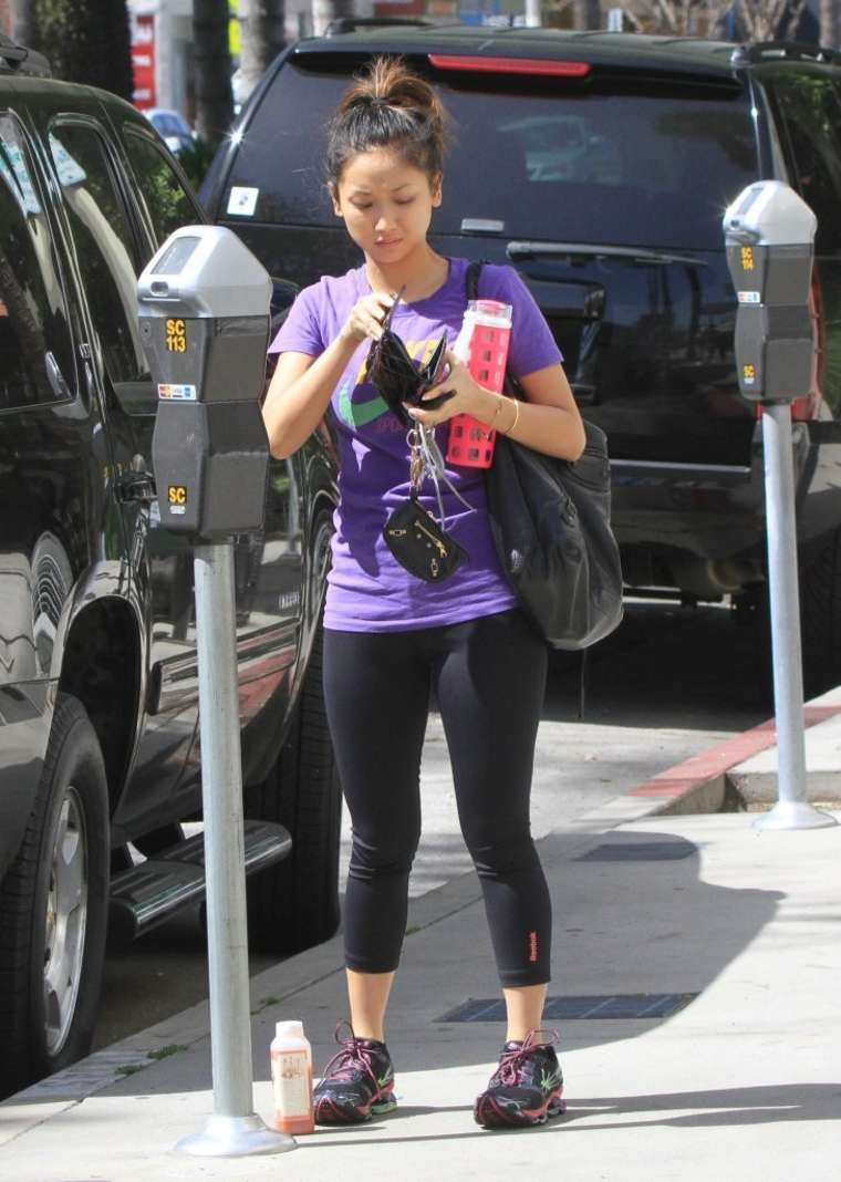 Brenda Song in Black Leggings Going to the gym in Studio City