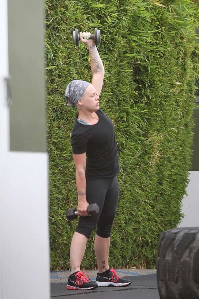 Pink in spandex working out in Los Angeles